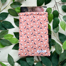 Load image into Gallery viewer, Flat Lay of Eliza with a book peeking out the top.