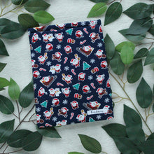 Load image into Gallery viewer, Jolly Santa Book Sleeve
