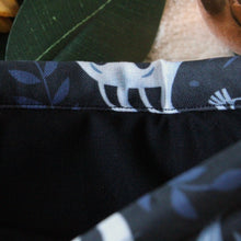 Load image into Gallery viewer, Ghost Kitties is being held open. Inside there is a black fabric inlay.