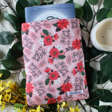 Load image into Gallery viewer, Circle of Shadows by Evelyn Skye is halfway in a Medium-sized Festive AF book sleeve.